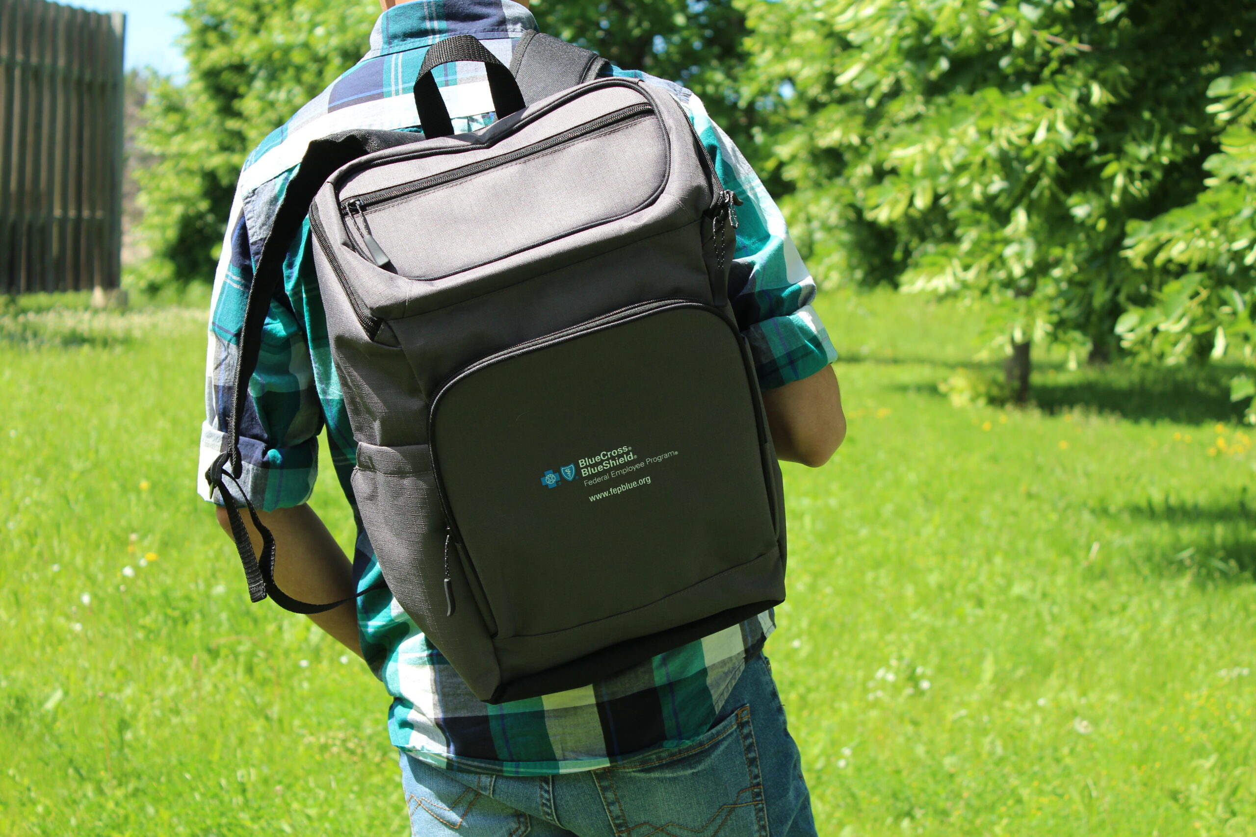 Team in branded apparel on location