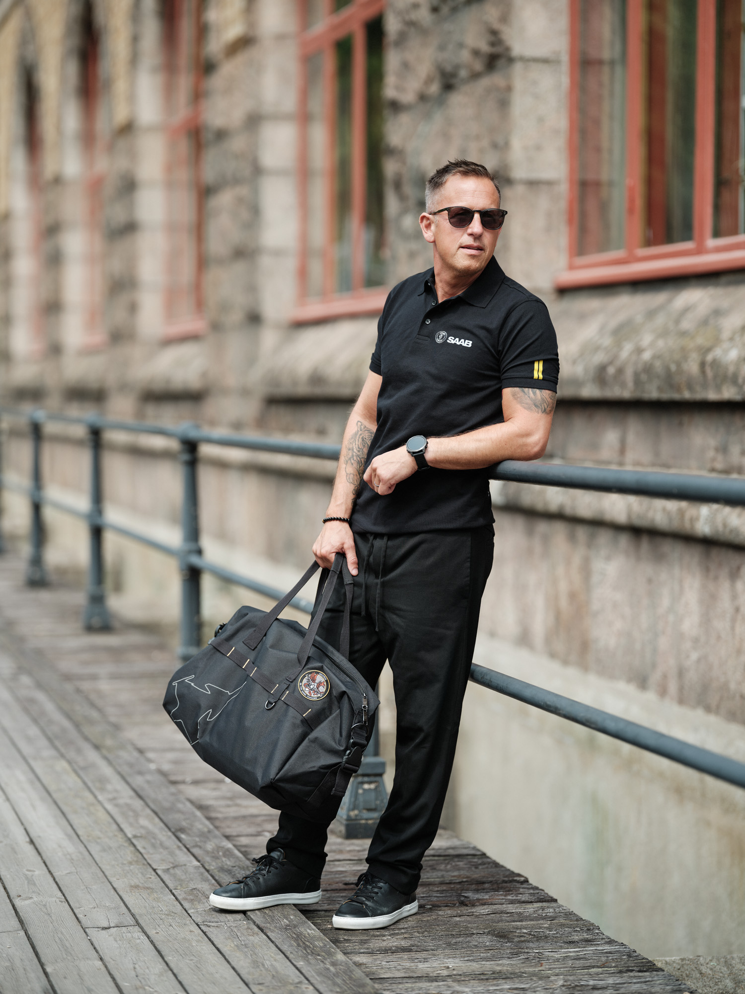 Team in branded apparel on location
